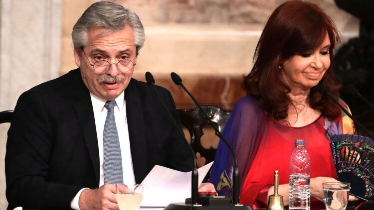 Argentine President Alberto Fernandez (L) delivers a speech, next to Vicepresident Cristina Fernandez de Kirchner, during the inauguration of the 138th period of ordinary sessions at the Congress in Buenos Aires, Argentina on March 1, 2020. (Photo by ALEJANDRO PAGNI / AFP)